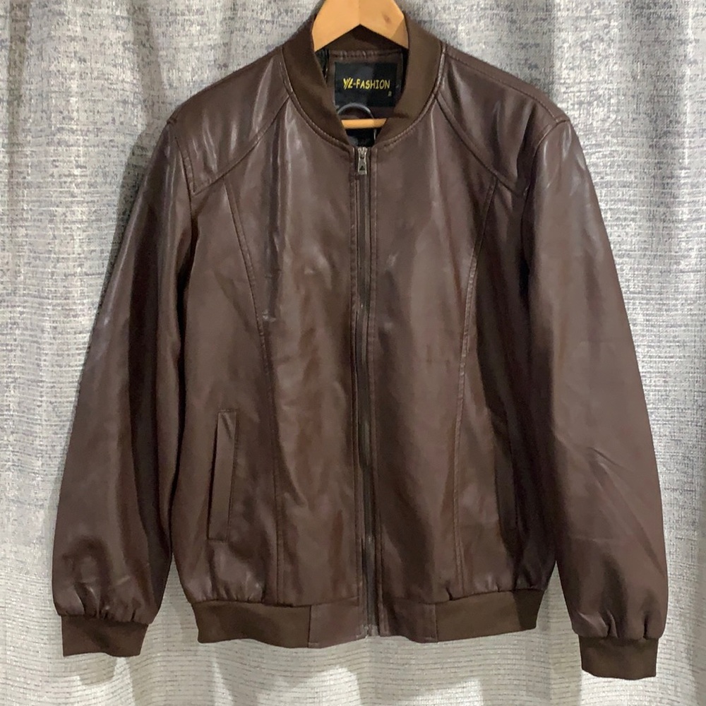 Soft Italian leather men’s jacket.  Chocolate color, lined.  Fitted style.